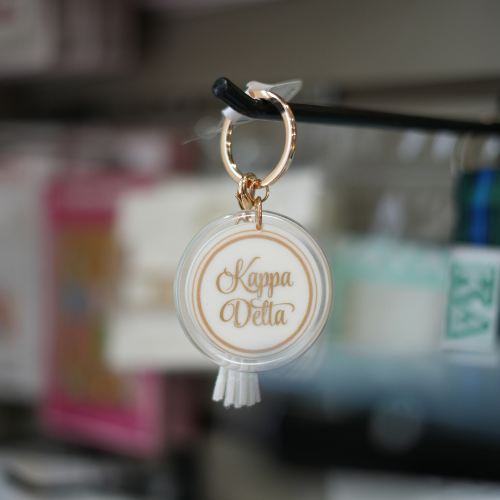 White Circle Keychain with Tassel